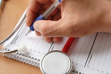 Image showing Doctor writing