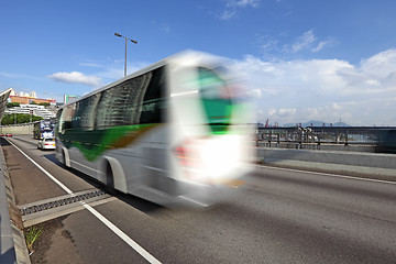 Image showing Fast moving bus