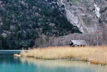 Image showing Beatiful lake with wooden house