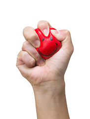 Image showing Hand squeezing smile face stress ball