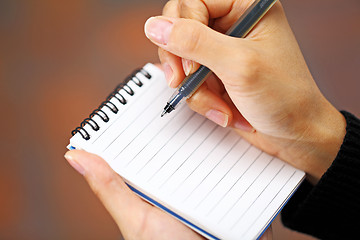 Image showing Pen in hand writing