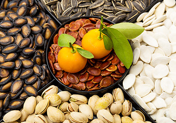 Image showing Chinese new year snack box and kumquat