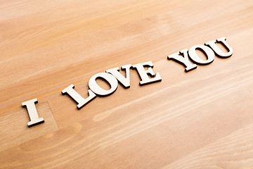 Image showing Wooden letters forming with phrase I Love You 