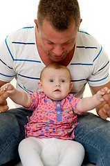 Image showing Father and baby are playing