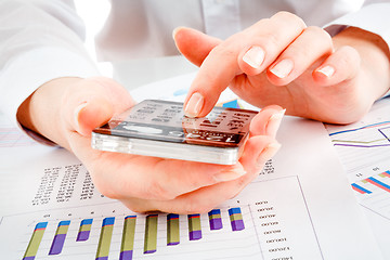 Image showing Smartphone with transparent screen in human hands.