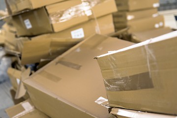 Image showing Opened cardboard box in a building