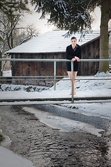 Image showing Young woman in costume in winter