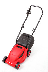 Image showing new red lawnmower on white background