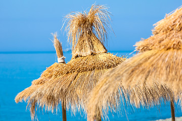 Image showing Straw umbrella hats