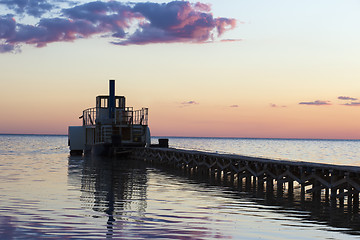 Image showing Ferryboat near the pier at sunset