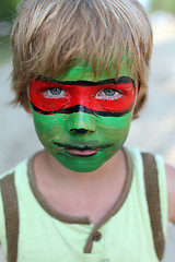 Image showing boy child with a mask on her face