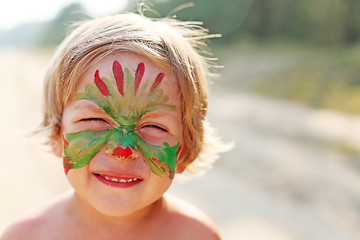 Image showing boy child with a mask on her face