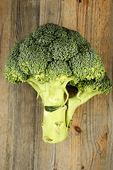 Image showing fresh cabbage broccoli on a wooden board