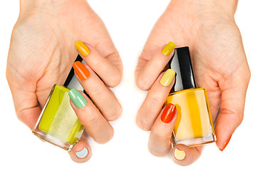 Image showing Women's hands with a colored nail varnish