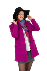 Image showing Cheerful girl in a coat and hat