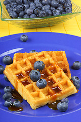 Image showing Waffle with syrup and fresh blueberries