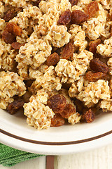 Image showing Crunchy oat clusters with raisins closeup