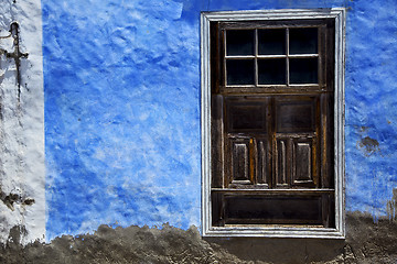 Image showing  brown wood   window in a blue wall arrecife lanzarote 