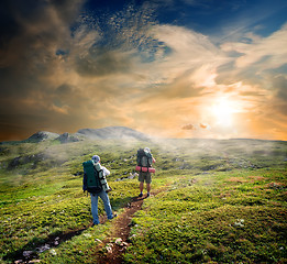 Image showing Backpackers in mountains