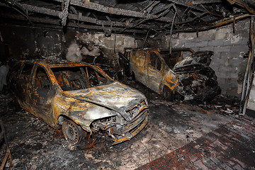 Image showing Close up photo of a burned out cars