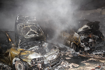 Image showing Close up photo of a burned out cars