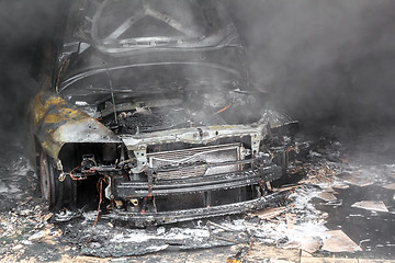 Image showing Close up photo of a burned out cars