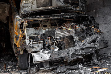 Image showing Close up photo of a burned out cars