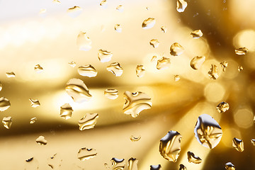 Image showing golden abstract background with water drops