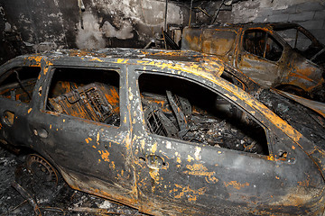 Image showing Close up photo of a burned out cars