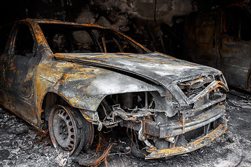 Image showing Close up photo of a burned out cars