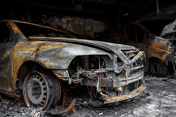 Image showing Close up photo of a burned out cars