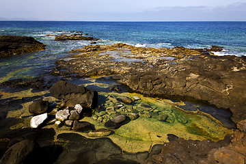 Image showing rock stone sky cloud beach  water  coastline  in lanzarote spain