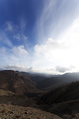 Image showing Mountains and blue sky with clouds