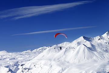 Image showing Sky gliding in snowy mountains at nice sun day