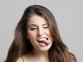 Image showing Girl with tongue out