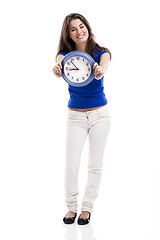 Image showing Beautiful woman with a clock