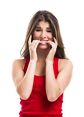 Image showing Girl biting her nails