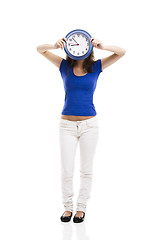 Image showing Beautiful woman with a clock