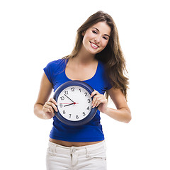 Image showing Beautiful woman with a clock