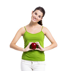 Image showing Healthy woman holding an apple