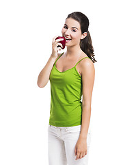 Image showing Healthy woman eating an apple