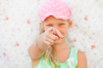 Image showing Young girl pointing with finger