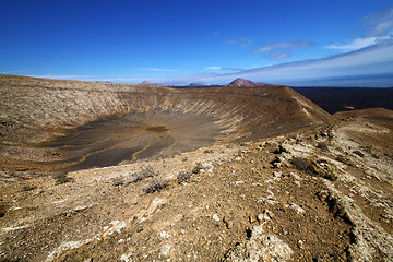 Image showing vulcanic timanfaya  rock stone in los volcanes 