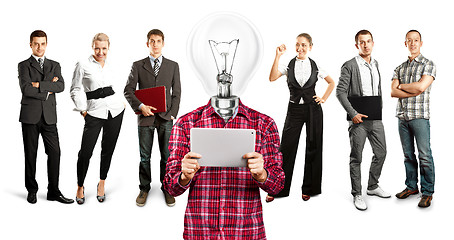 Image showing Business Team With Lamp Head