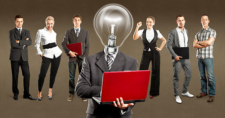 Image showing Business Team With Lamp Head