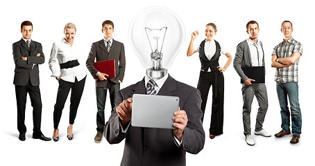 Image showing Business Team With Lamp Head