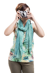 Image showing Woman taking a photo with a vintage camera