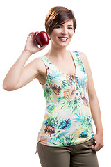 Image showing Beautiful woman holding a red apple