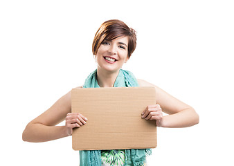 Image showing Beautiful woman with a cardboard