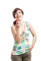 Image showing Happy woman with a apple